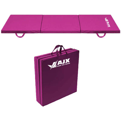 An elegant pink yoga mat laid out on a marble floor, with yoga accessories like blocks and a water bottle beside it